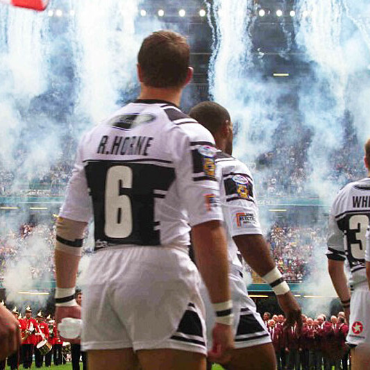 A photo of Hull players, including Richard Horne and Kirk Yeaman, walking out onto the pitch before the Rugby League Challenge Cup Final 2005