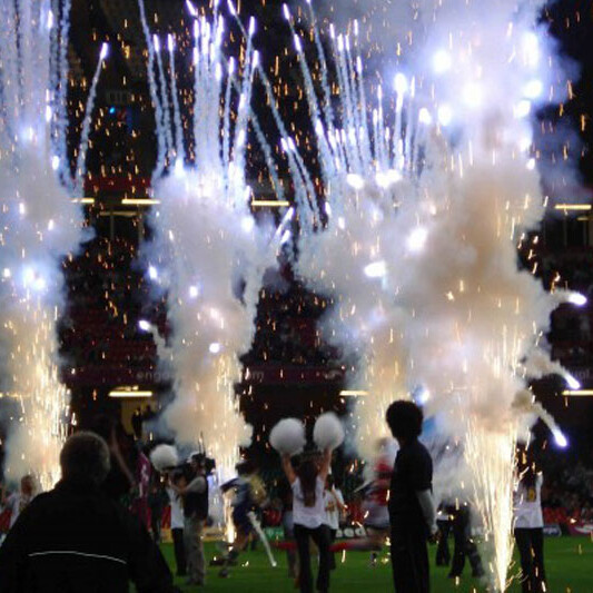 A photo of fireworks and cheerleaders as the teams run out during the Rugby Football League Magic Weekend 2010