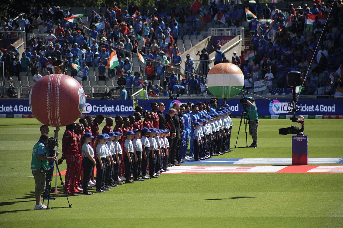 A photo of the West Indian and Indian cricket sides lined up for their national anthems, prior to a match at the ICC Men's Cricket World Cup 2019